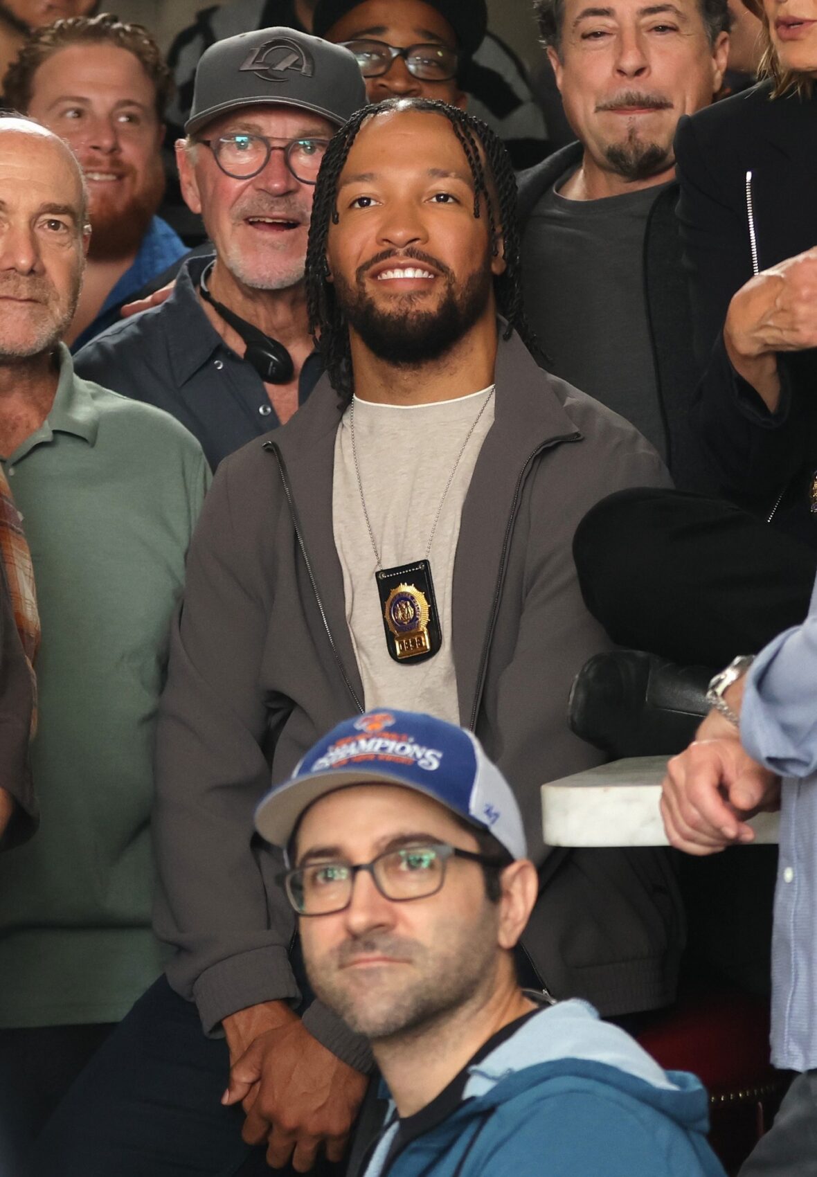 Jalen Brunson poses with crew on set of Law & Order: SVU
