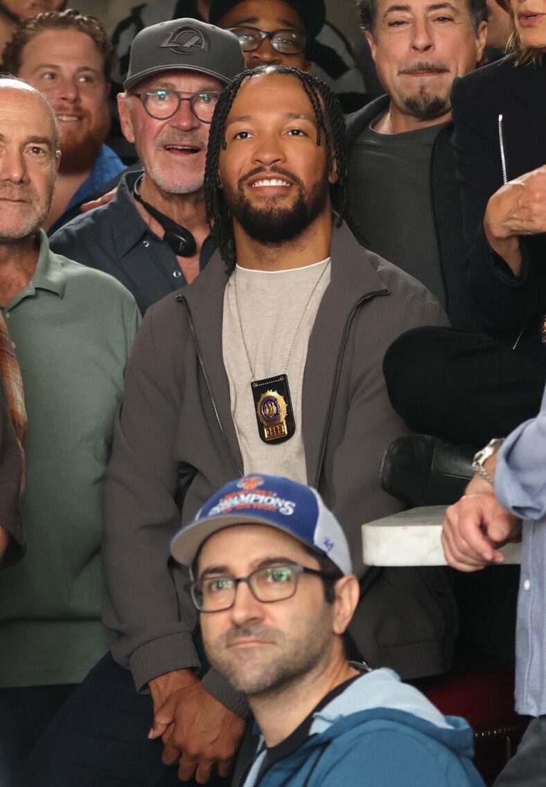 Jalen Brunson poses with crew on set of Law & Order: SVU