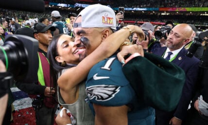 Jalen Hurts and his wife Bry Burrows on the NFL field
