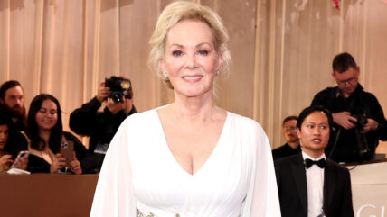 Jean Smart in a white dress at an event.