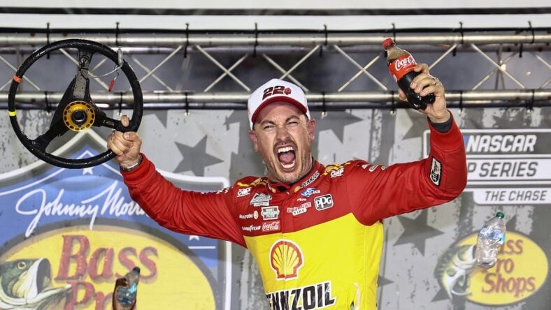 Joey Logano celebrating NASCAR photo