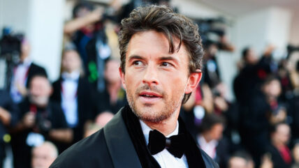 Jonathan Bailey on the red carpet at Venice Film Festival