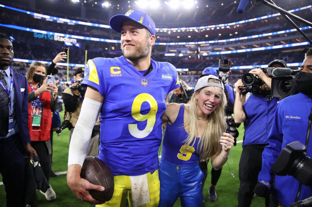 Kelly Stafford and Matthew Stafford together in a stock image from his NFL career