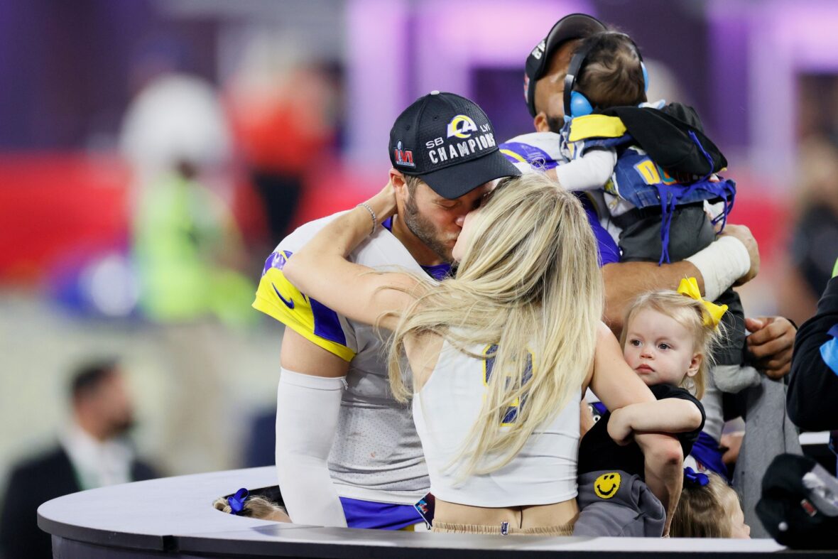Kelly Stafford and Matthew Stafford together in a stock image from his NFL career