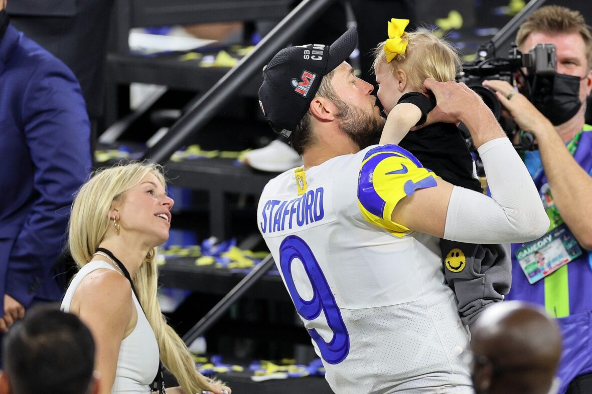 Kelly Stafford and Matthew Stafford together in a stock image from his NFL career