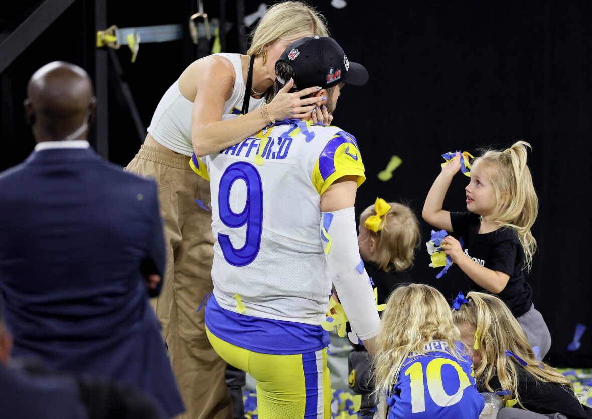 Kelly Stafford and Matthew Stafford together in a stock image from his NFL career