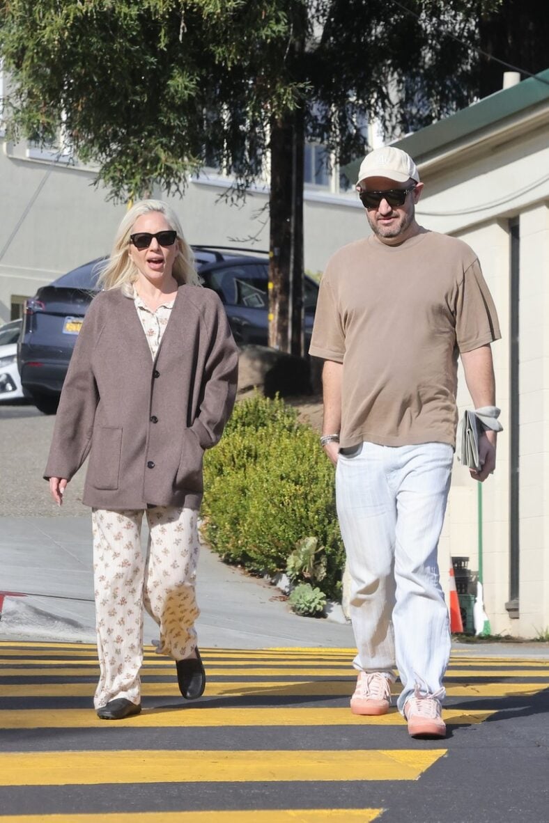 Lady Gaga wears a cardigan while walking alongside manager Bobby Campbell.