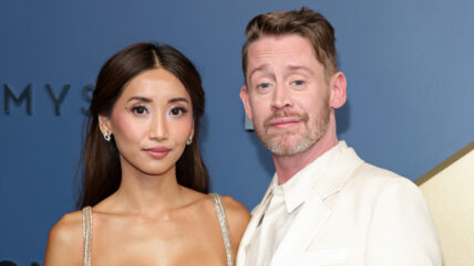 Brenda Song and Macaulay Culkin pose at the Emmy Awards 2026
