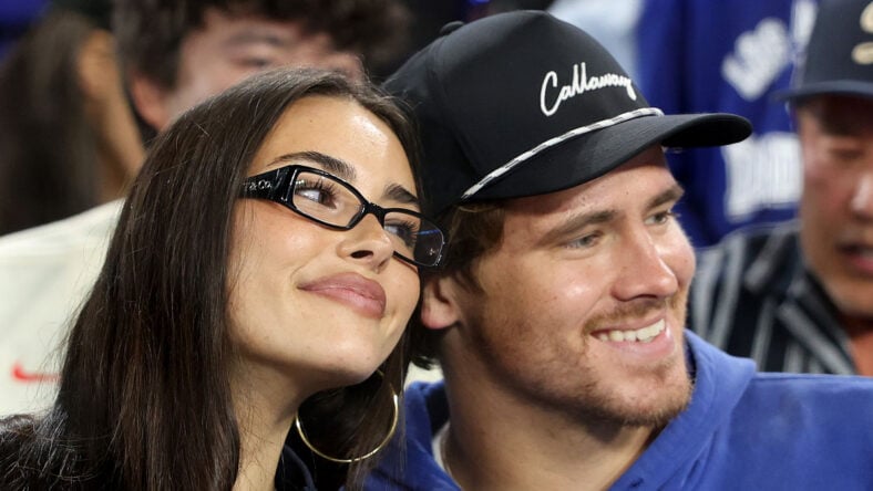 Madison Beer & Justin Herbert stock image from an MLB game