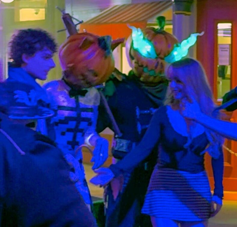 Mason Thames and Mckenna Grace at Universal Studios Horror Nights