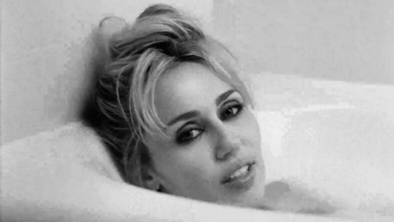Miley Cyrus in bathtub for Let's Get Married video