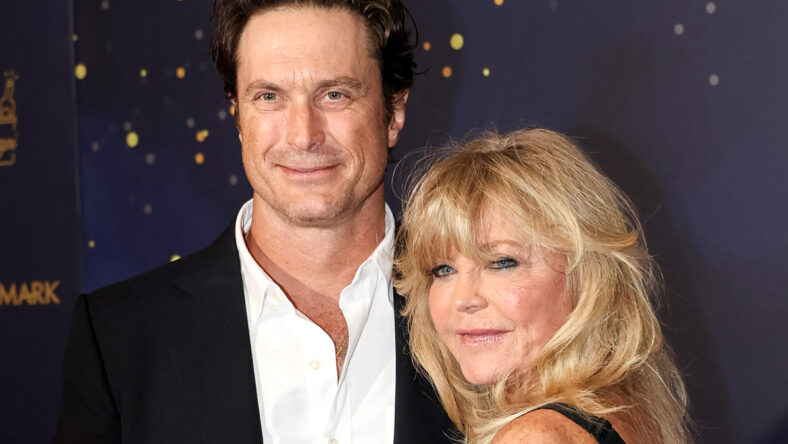Oliver Hudson poses alongside Goldie Hawn.