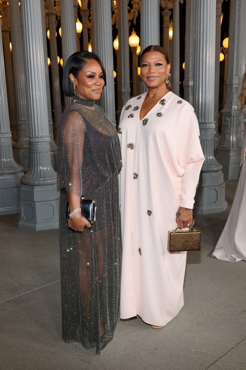 Queen Latifah and Eboni Nichols pose together at an event.