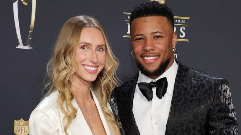 Saquon Barkley and fiancee Anna Congdon stock image