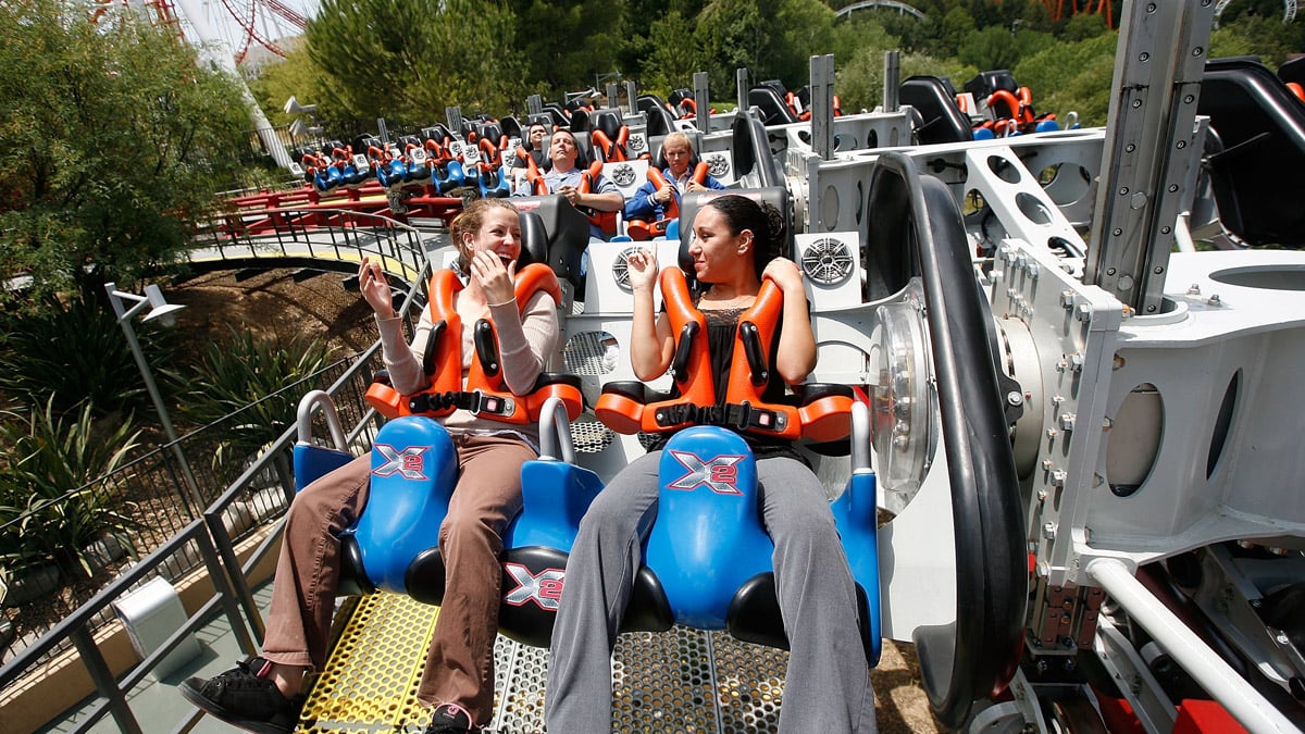 Six Flags Permanently Closes X2 Roller Coaster After Multiple Injuries Reported, Including Death & Brain Injuries
