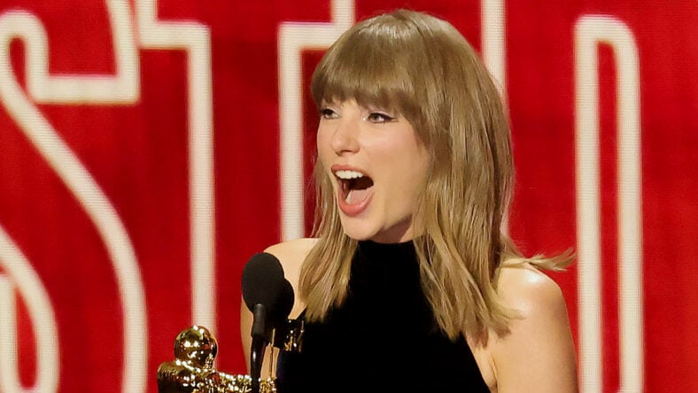 Taylor Swift speaks on stage at the 2026 MTV VMAs