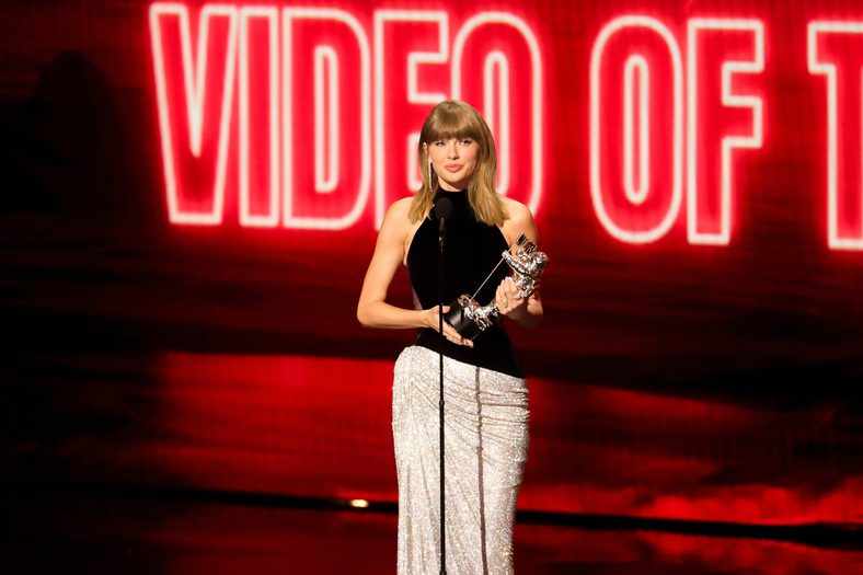 Taylor Swift speaks on stage at the 2026 MTV VMAs