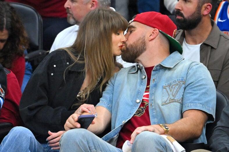 Taylor Swift and Travis Kelce kissing