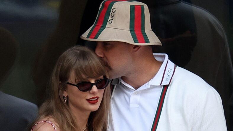 Travis Kelce kissing Taylor Swift