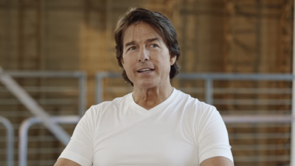 Tom Cruise talking in white shirt