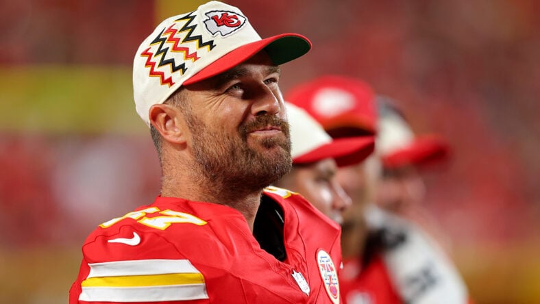 Tight end Travis Kelce #87 of the Kansas City Chiefs watches NFL preseason game action during the second quarter against the Seattle Seahawks at Arrowhead Stadium.