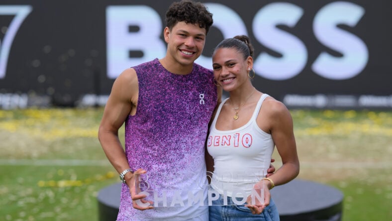Ben Shelton of United States of America and his girlfriend Trinity Rodman of United States of America celebrates with trophy.