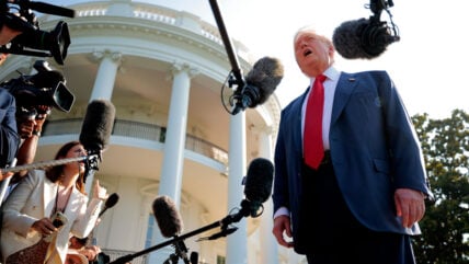 President Donald Trump talks to reporters as he departs the White House on July 25, 2025 in Washington, DC.