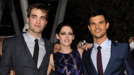 Robert Pattinson, Kristen Stewart, and Taylor Lautner attend the premiere of "The Twilight Saga: Breaking Dawn - Part 1" premiere