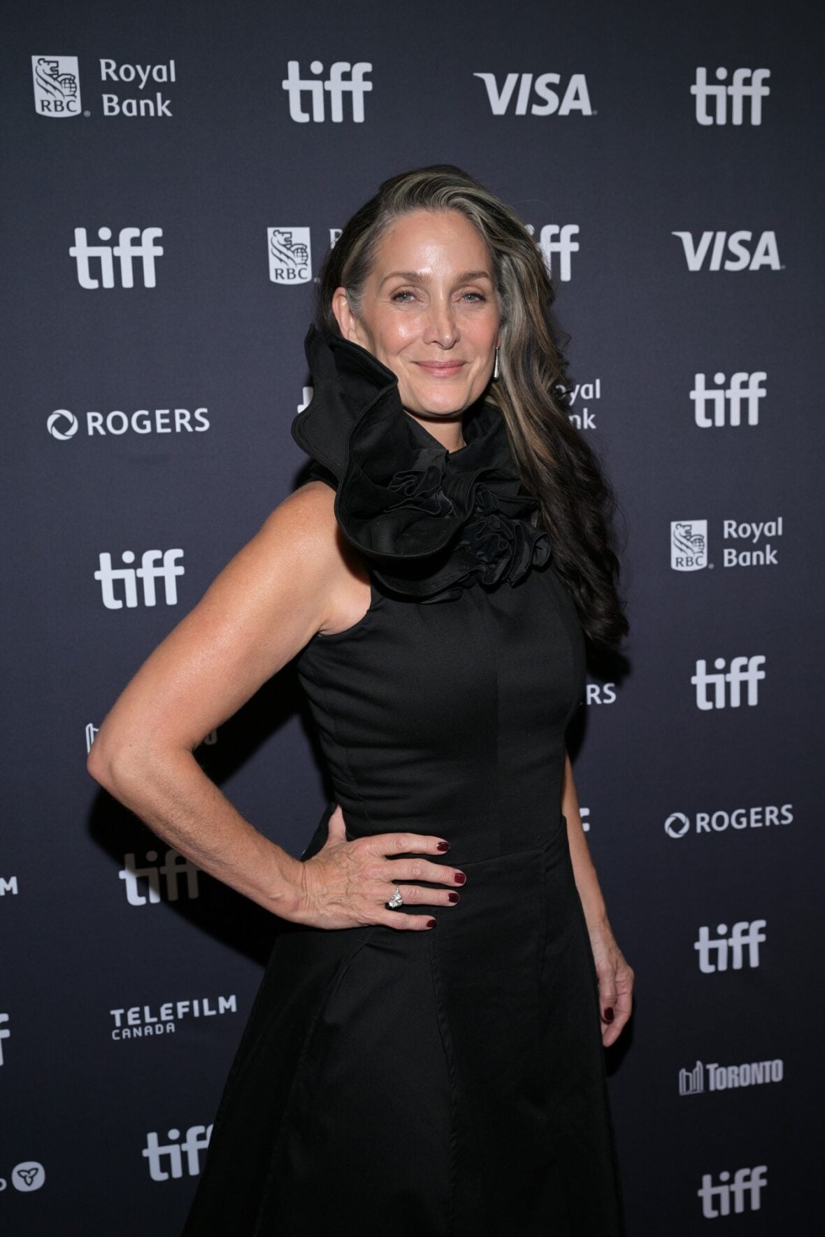 Carrie-Anne Moss poses at the TIFF premiere of her new series Yaga