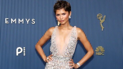 Zendaya at the 2026 Emmy Awards red carpet in a shimmering silver sheer gown.