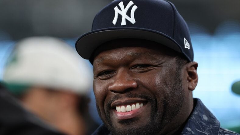Rapper 50 Cent is seen on the sidelines prior to the game between the Buffalo Bills and the New York Jets at MetLife Stadium on October 14, 2024
