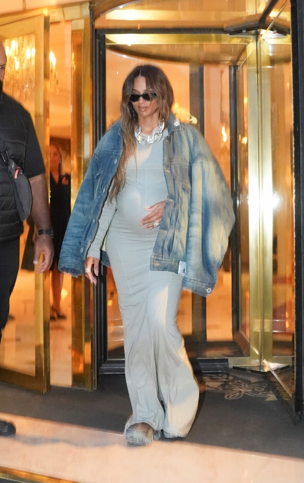 Ciara, who is currently expecting her fifth child, wore a form-fitting dress while stepping out on Friday in Paris.
