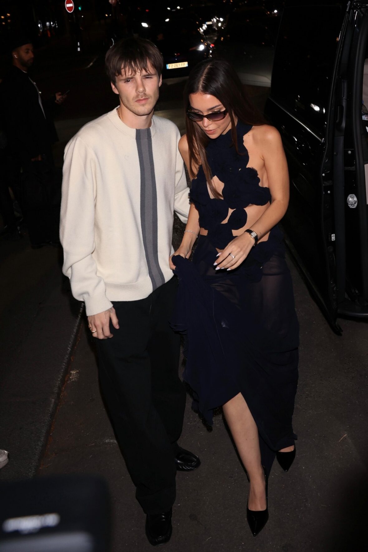 Cruz Beckham and his girlfriend Jackie Apostel were spotted stepping out in Paris on Friday after his mom's fashion show.