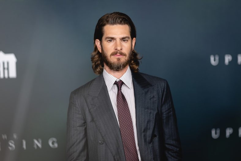 Andrew Garfield posing on red carpet