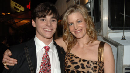 RJ Mitte and Anna Gunn pose at the Breaking Bad premiere