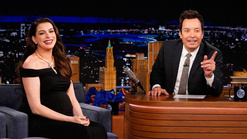 Anne Hathaway speaking to Jimmy Fallon during her Tonight Show appearance on September 30