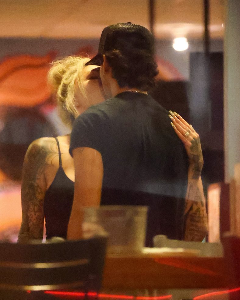 Bunnie XO and Dylan Wolf share a kiss at dinner in Sherman Oaks
