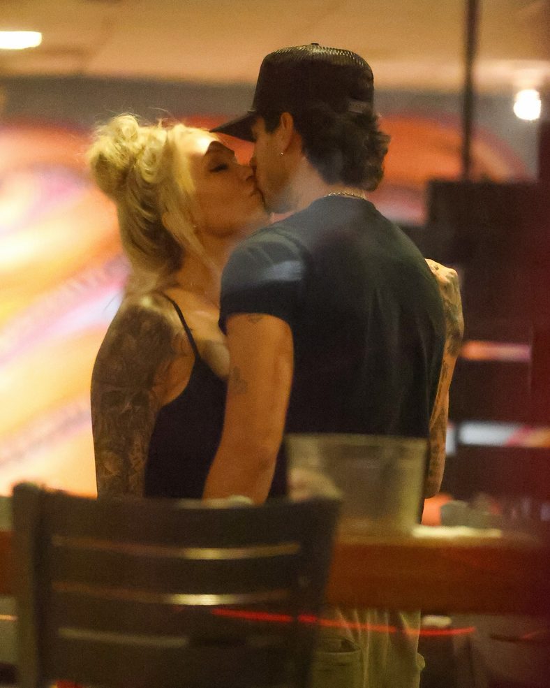 Bunnie XO and Dylan Wolf share a kiss at dinner in Sherman Oaks