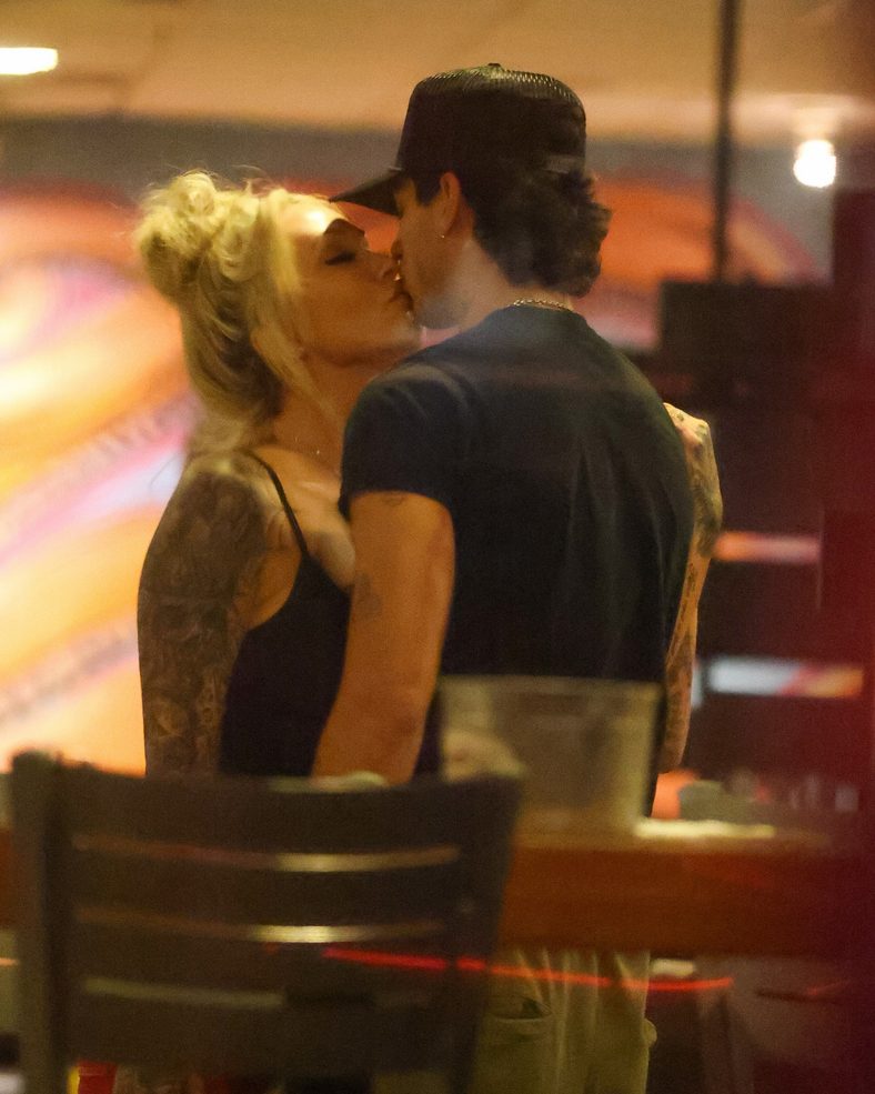Bunnie XO and Dylan Wolf share a kiss at dinner in Sherman Oaks