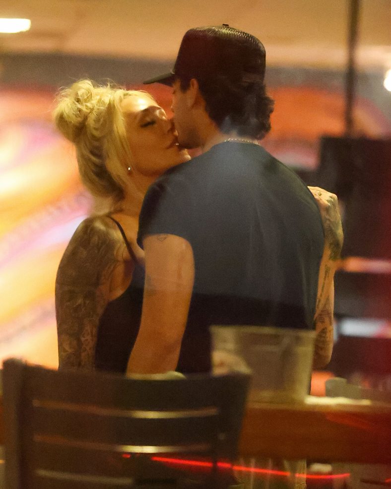 Bunnie XO and Dylan Wolf share a kiss at dinner in Sherman Oaks