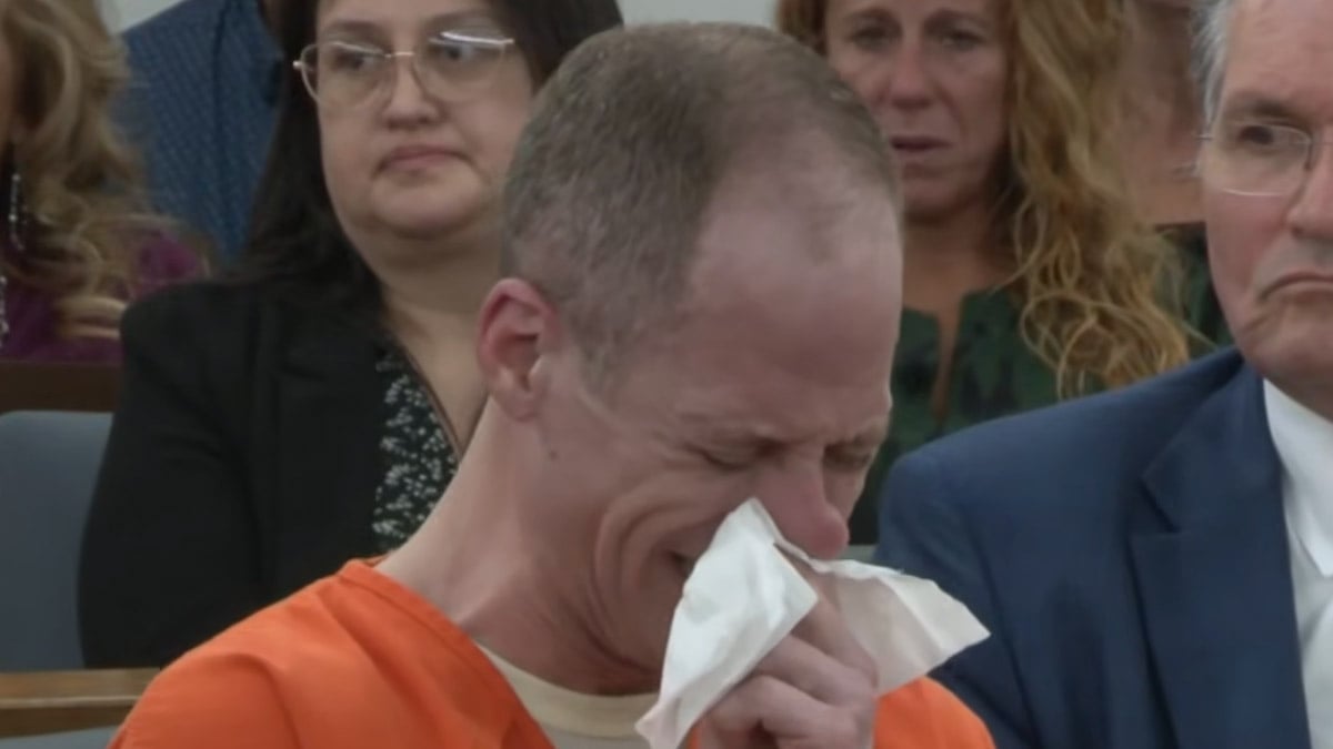 Caleb Flynn cries in court