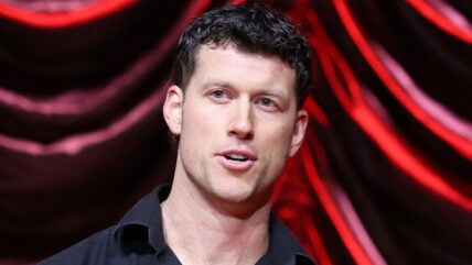 ) Clayton Echard and Stephani Young speak onstage during the 2026 iHeartPodcast Awards at the ACL Live at the Moody Theater on March 16, 2026 in Austin, Texas