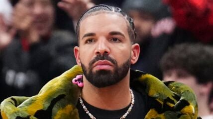 Drake watches on as the Sacramento Kings play the Toronto Raptors during the second half of their basketball game at the Scotiabank Arena on November 2, 2024 i