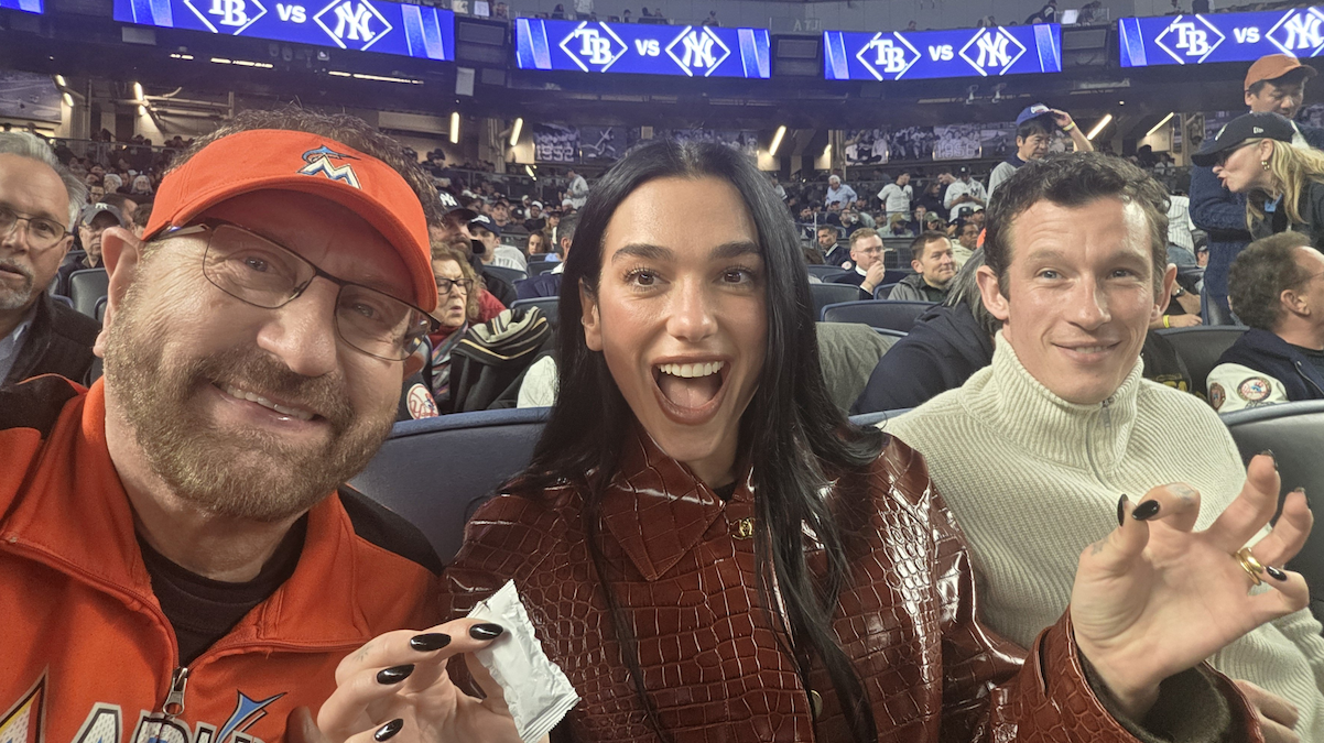 Dua Lipa & Husband Callum Turner Sit Next to Baseball Fan Who Has No Idea Who They Are