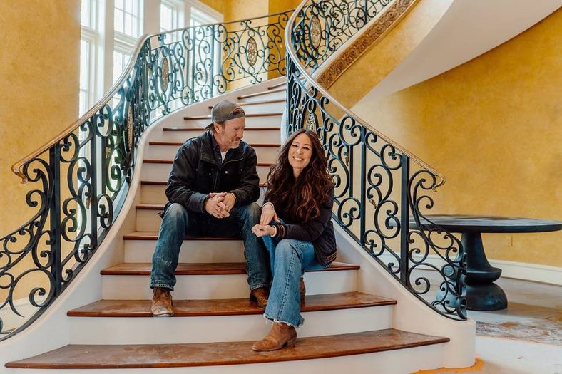 Chip and Joanna Gaines pose for a photo for new series Fixer Upper: Chip Bought a Mansion