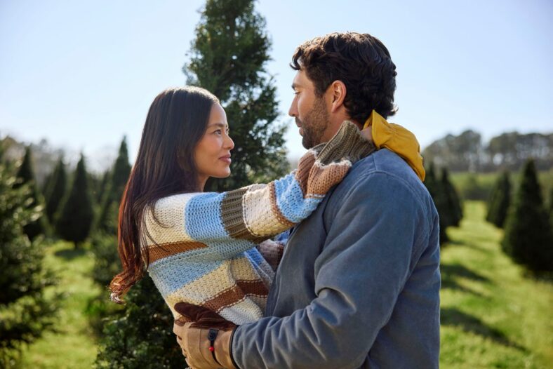 The Holiday Spark on Roku movie stills with Joey Graziadei and Jamie Chung