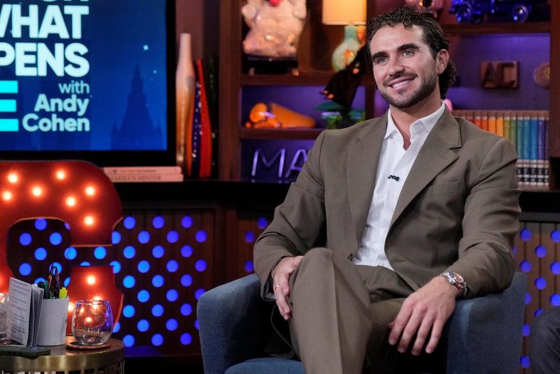 Joe Bradley smiles while appearing on Watch What Happens Live