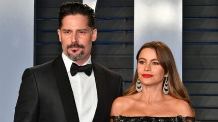 Joe Manganiello and Sofia Vergara pose on the red carpet at the 2018 Vanity Fair Oscar Party
