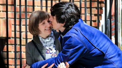 Lena Dunham and Adam Driver nearly kissing while filming Girls in NYC