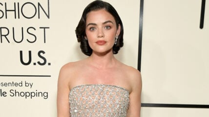 Actress Lucy Hale in a silver strapless dress at a Fashion Trust U.S. event.